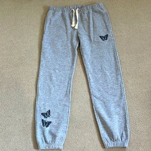 Sweatpants with embroidered butterflies